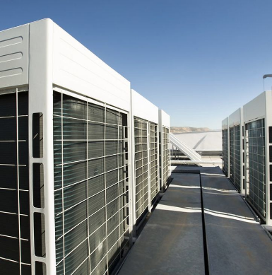 Picture of large refrigeration equipment on top of an industrial building in Apopka Florida.