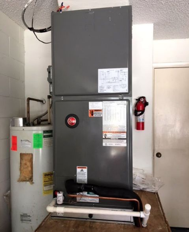 HVAC technician in central Florida work on commercial boiler and heating system. 
