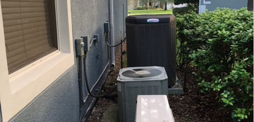Image of various pieces of installed HVAC units set up on a residential home in Apopka Florida.